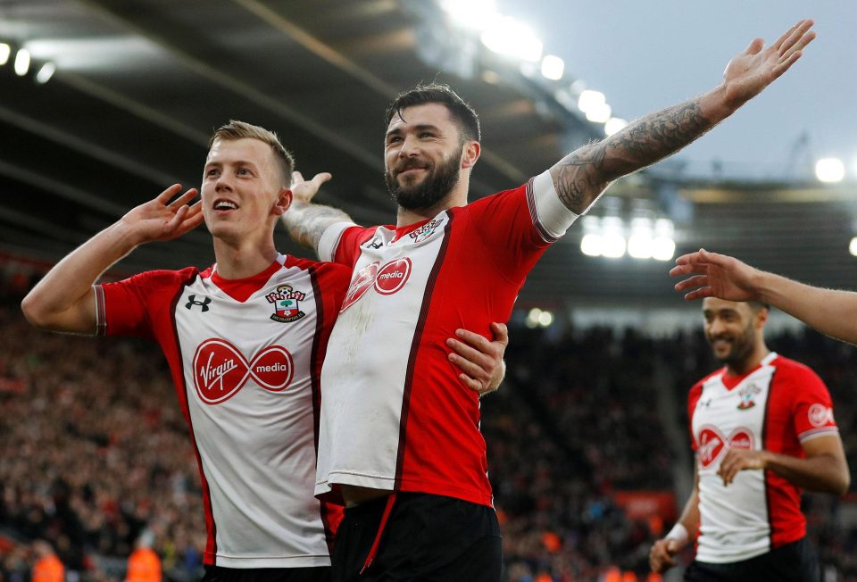  Charlie Austin hails his opener int he 1-1 draw but his goal was overshadowed by his clash with Terriers keeper Jonas Lossl