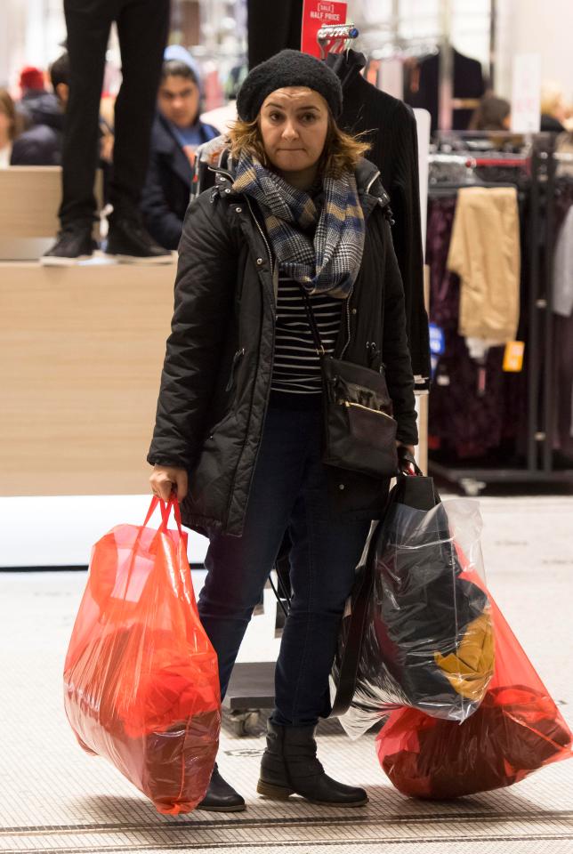  Shoppers spend Boxing Day sale at the Next store on Queen Street in Cardiff, Wales