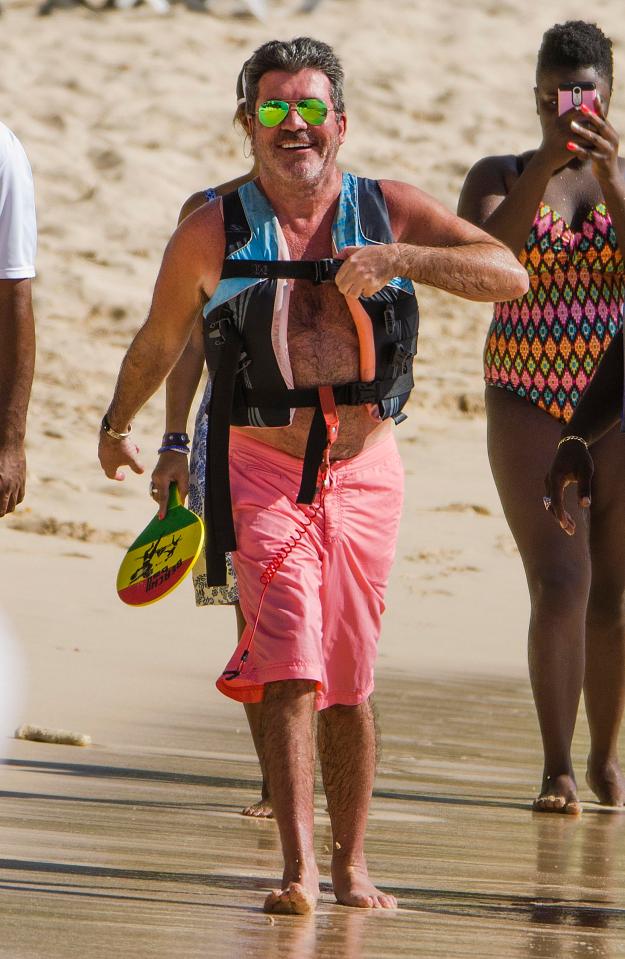  Simon Cowell couldn't stop smiling after an afternoon of jet-skiing