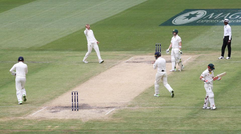  Joe Root celebrates the wicket of David Warner