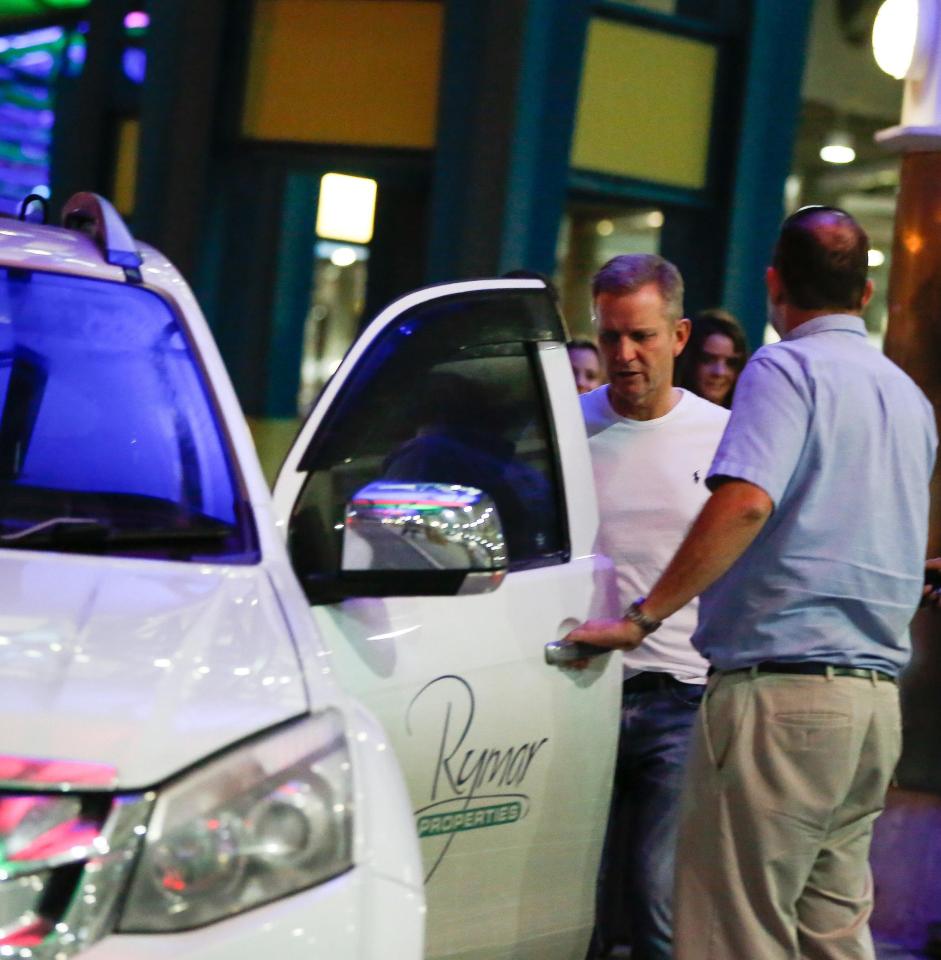  He got into a car on the island as he relaxed with his girlfriend and some friends