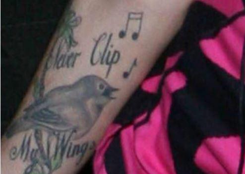  He also claims the late singer visits his and his wife Jane in the form of a bird that looks just like her tattoo