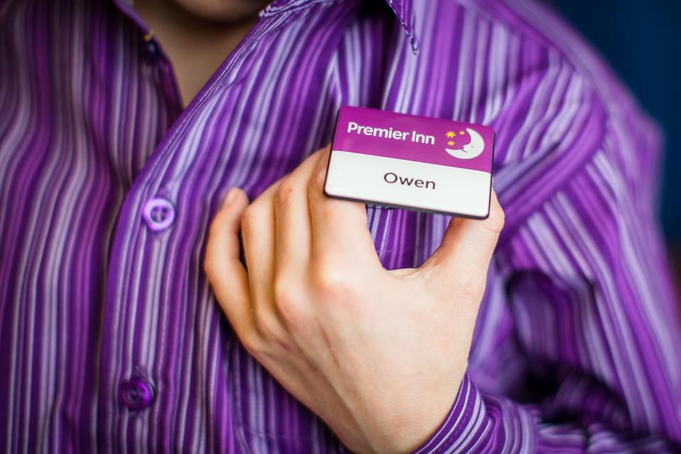  The outfit matches the uniforms worn by actual Premier Inn reception staff