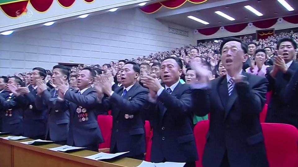  Their enthusiastic cheers and claps filled the large room