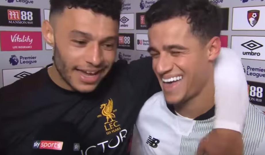  Alex Oxlade-Chamberlain and Philippe Coutinho laugh together in post-match interview