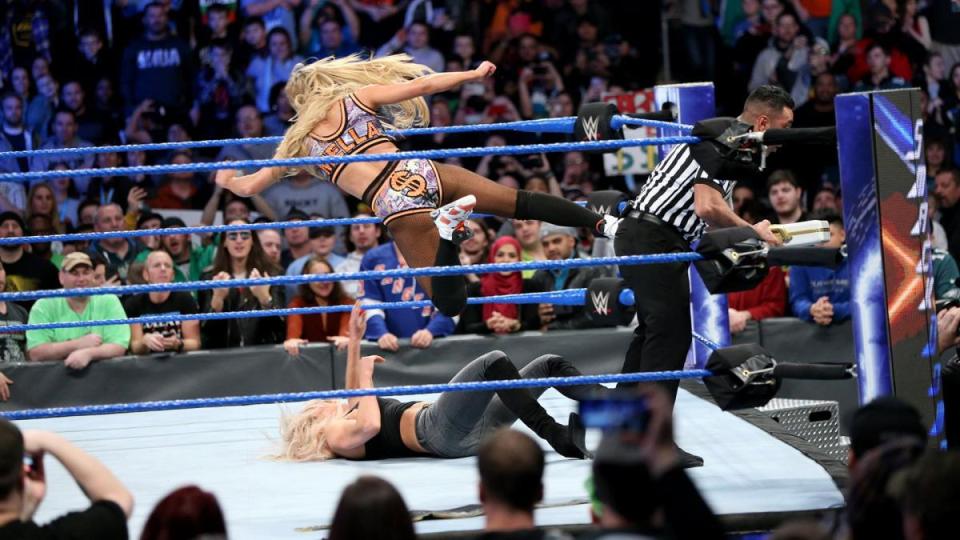  Carmella boots the ref by mistake