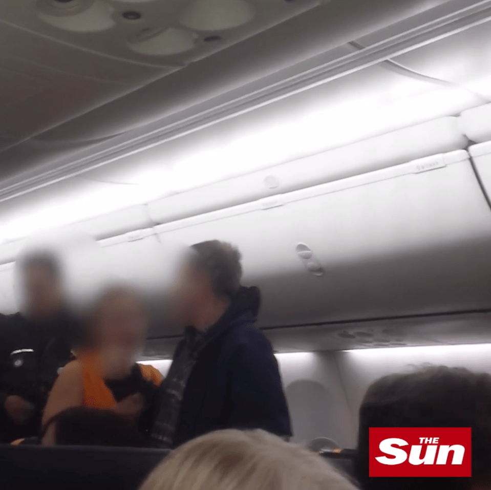  The passengers cheered as she was led off with her husband