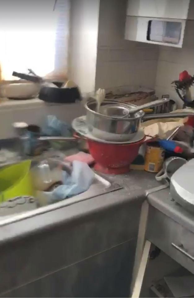  Dirty dishes litter the filthy kitchen in the Middlesbrough home