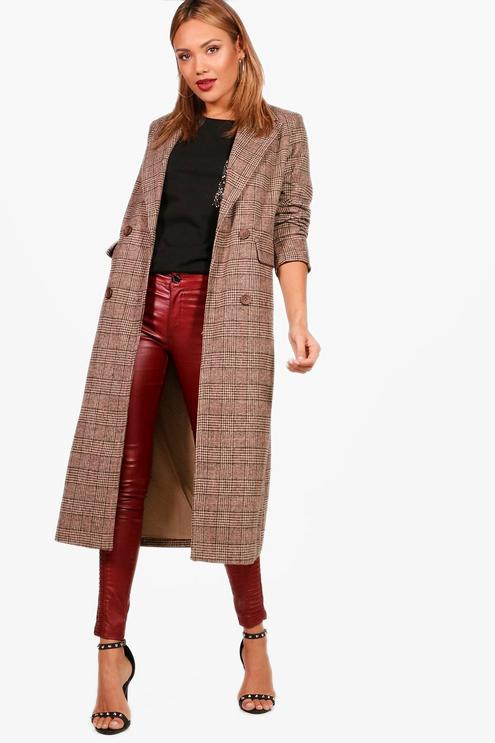  The coat comes in a brown colour with check designers and buttons