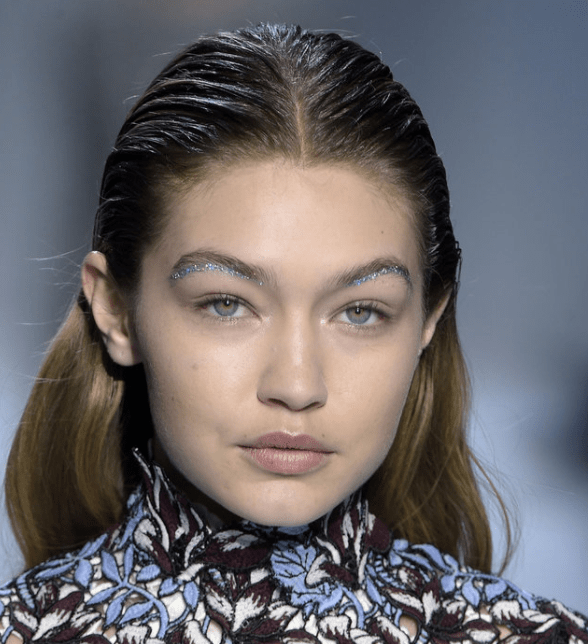  Gigi Hadid sported the glitter browliner trend on the catwalk