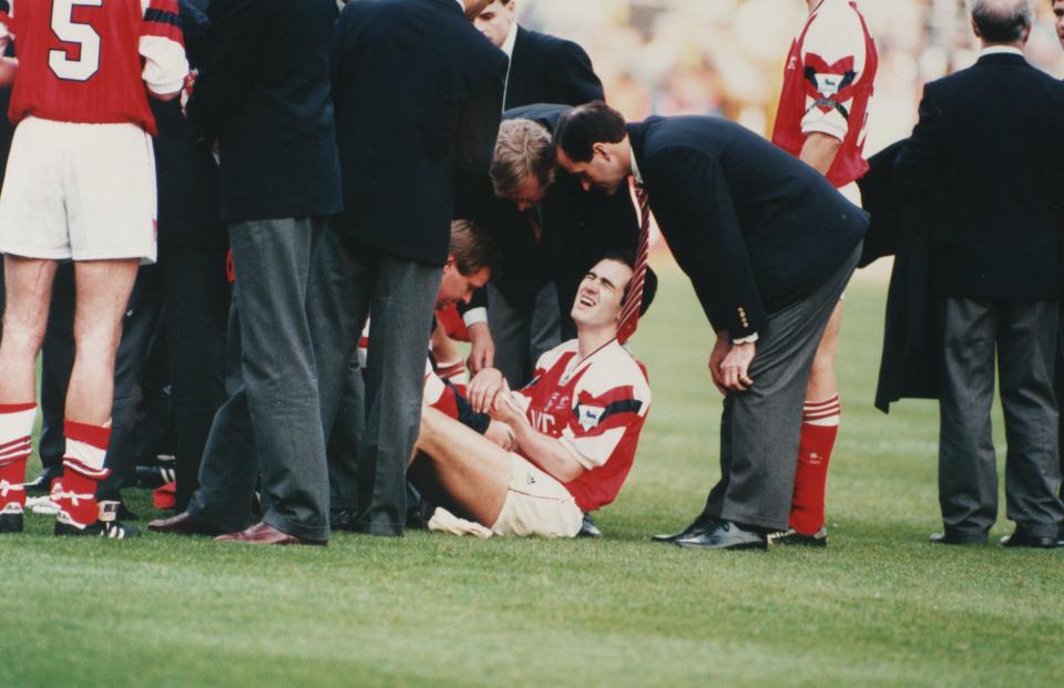  Tony Adams dropped him to the ground and broke his arm as he attempted to lift him to celebrate at full time