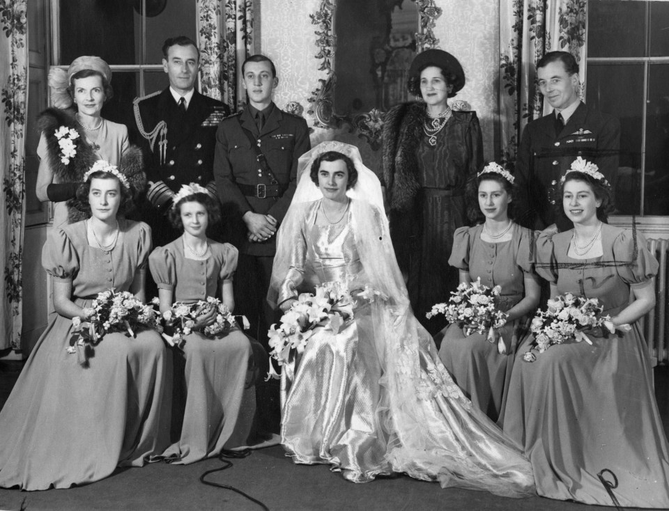 Lady Pamela is sat on the left of the front row in her sister’s wedding picture, with Princess Elizabeth on the far right