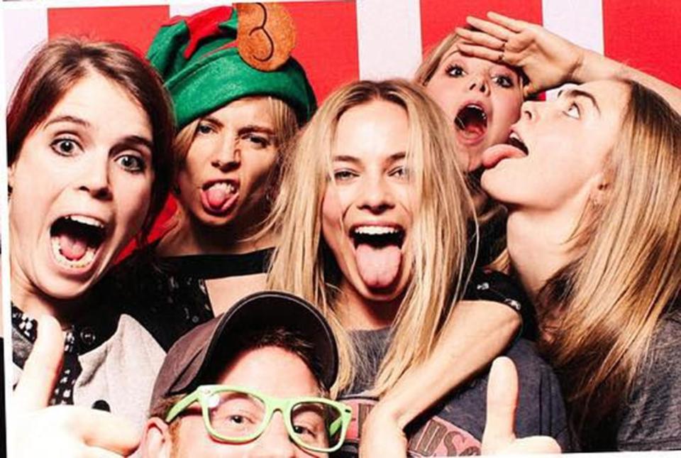  Famous friends . . . Eugenie with Sienna Miller, Margot Robbie, Poppy Jamie, Cara Delevingne and Prince Harry, front