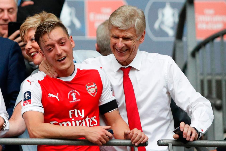  Mesut Ozil will be staying put at Arsenal with a new three-and-a-half year contract