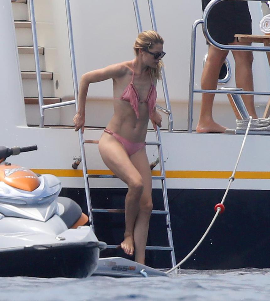  Doutzen Kroes stunned in a bright pink bikini while holidaying in France last summer