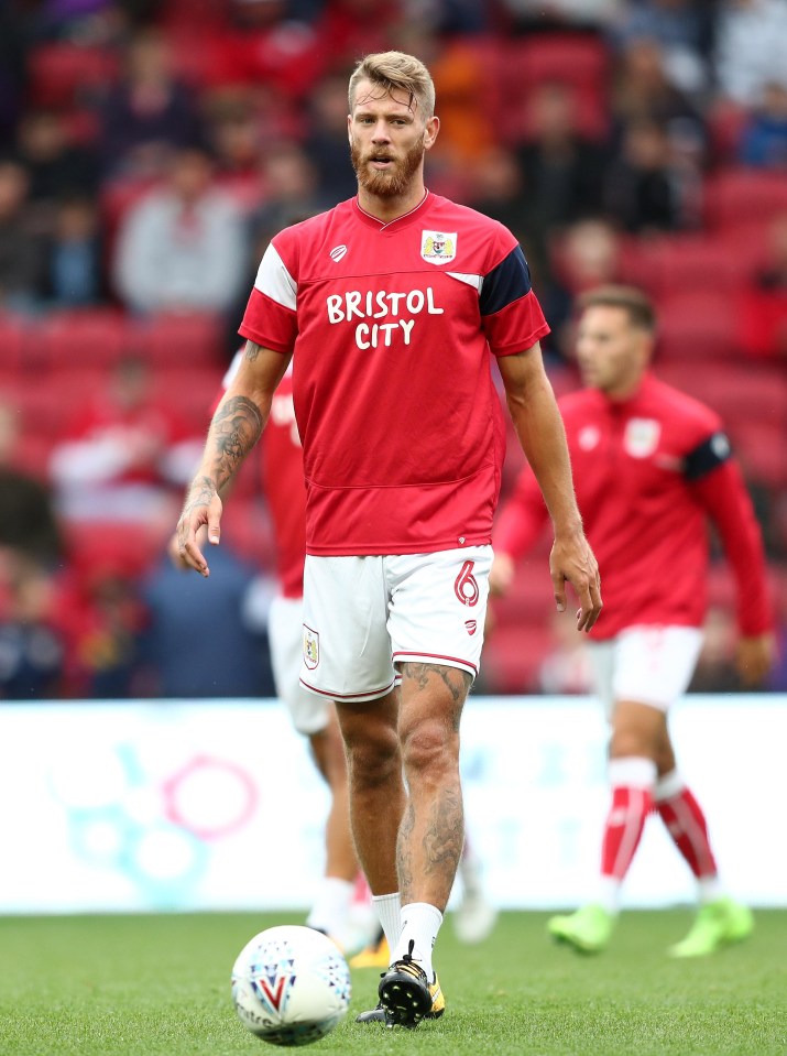 Nathan Baker received a red card for this tackle on Josh Scowen, leaving him suspended for the game against Bolton