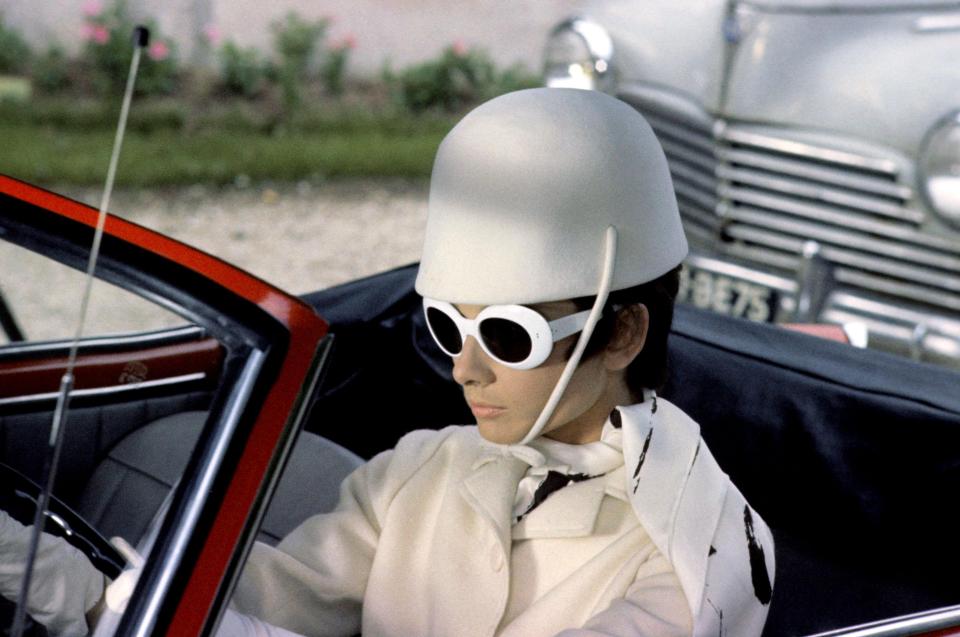  1966: On the set of How To Steal a Million, Audrey channels the look of the sixties with her chunky sunglasses