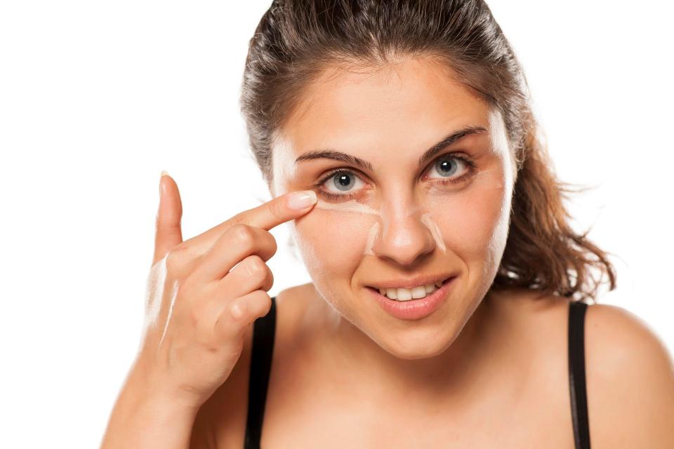  Applying concealer with your hands may make your under-eye area look more natural