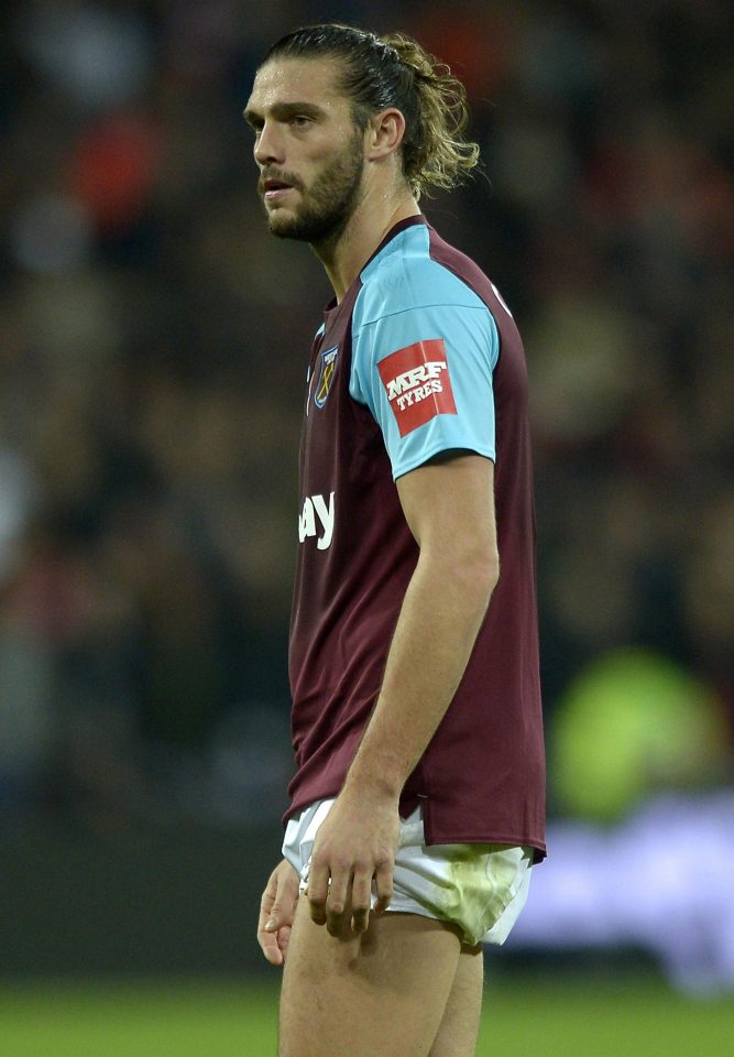  West Ham striker Andy Carroll may undergo surgery on his ankle