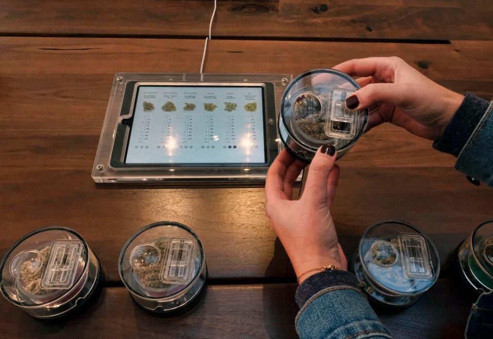  Pictured are sample containers of marijuana at a medical dispensary in Los Angeles