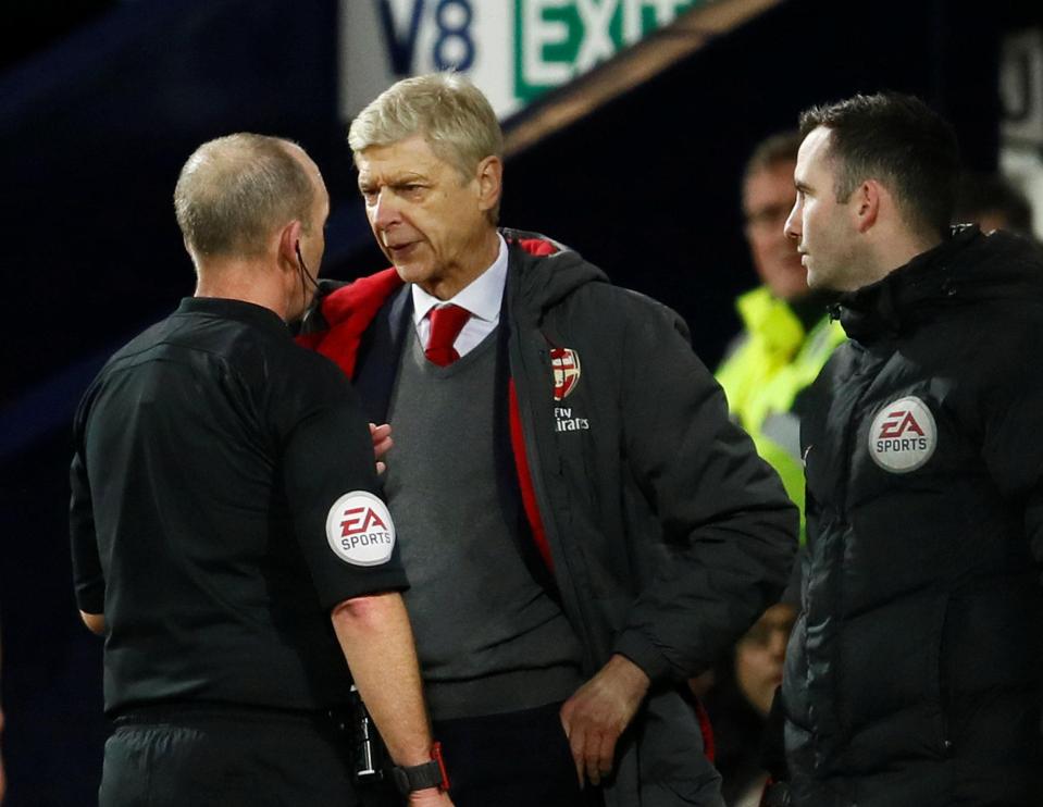  Arsene Wenger faces a stadium ban after criticising ref Mike Dean