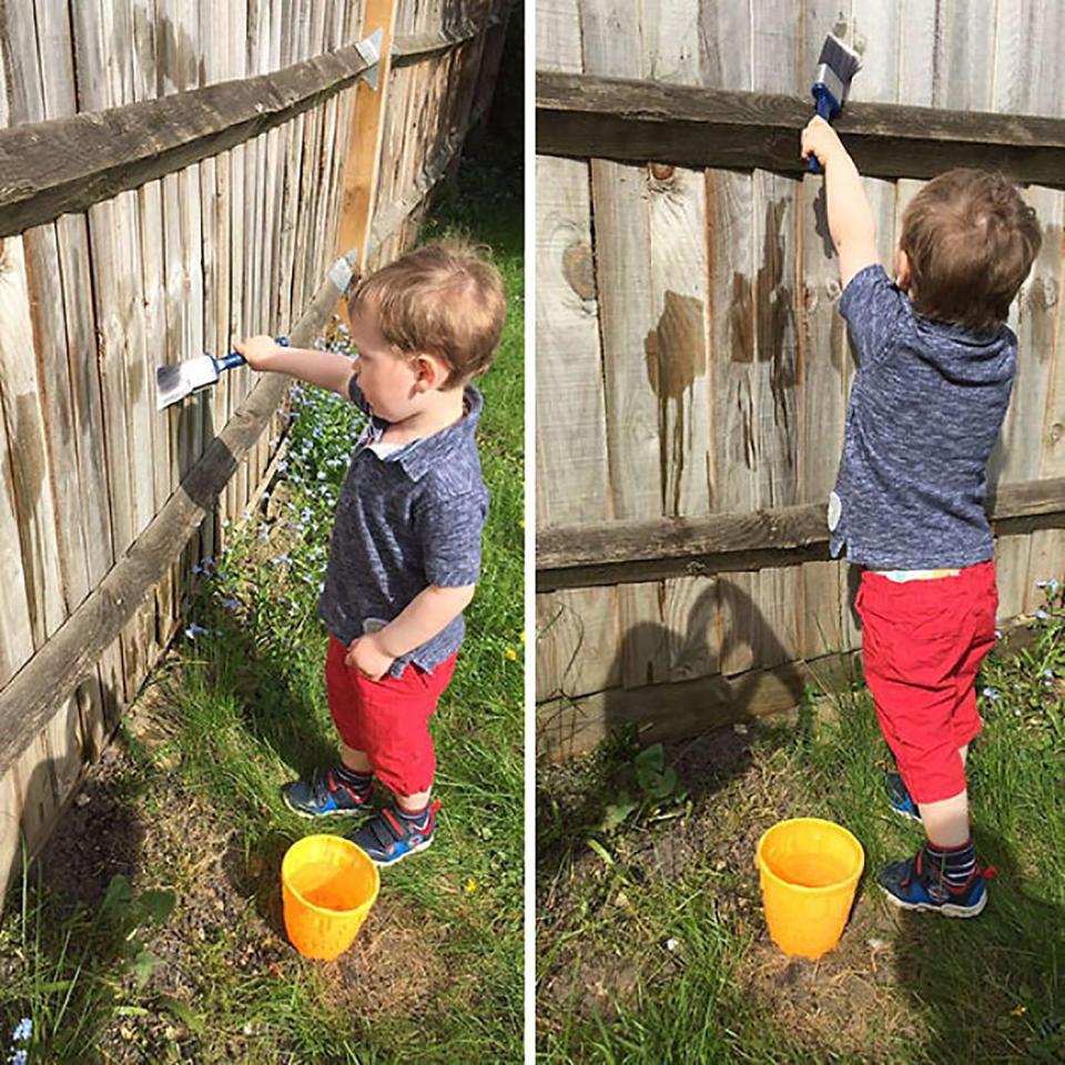  This tot has no idea he's really using water to paint