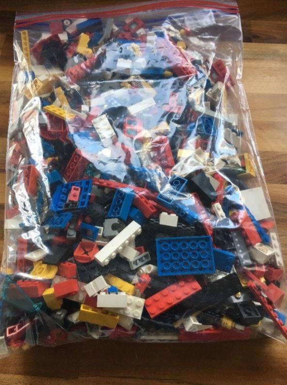  A bag of mixed up Lego bricks and figures sold on eBay for £23