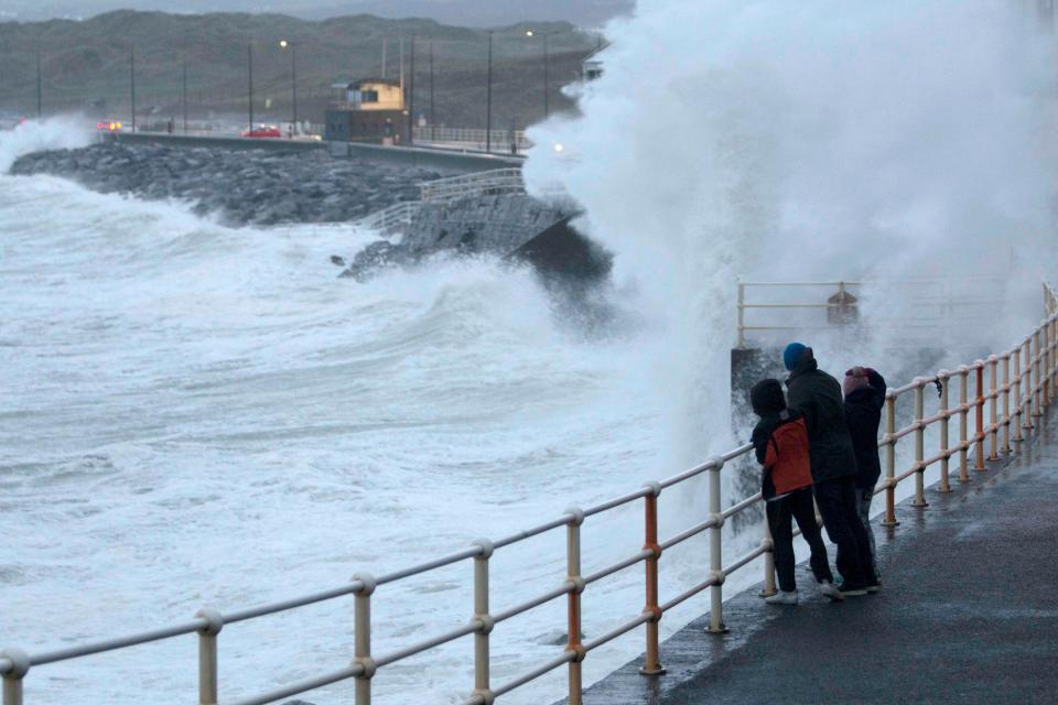  Brave weather watchers face down Storm Eleanor in Lahinch, County Clare