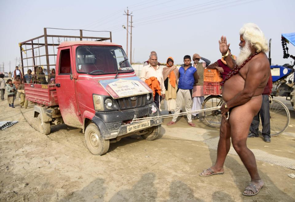  The bearded sadhu was demonstrating his spiritual strength in the painful ritual