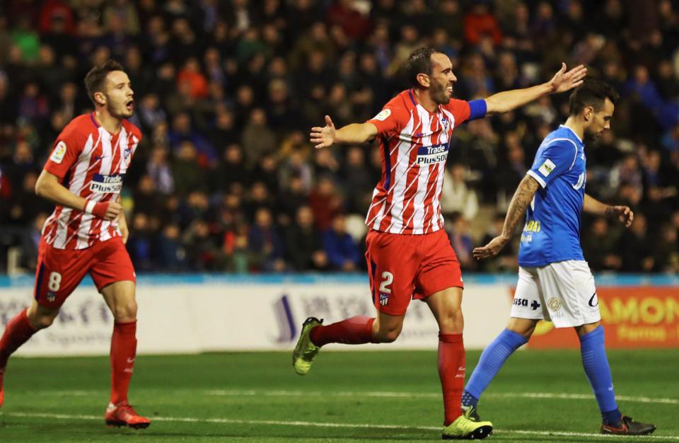  Diego Godin celebrates putting the visitors ahead after 33 minutes