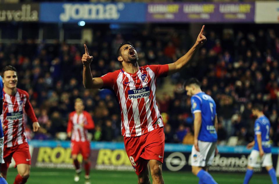  Diego Costa celebrates after scoring five minutes into his Atletico return