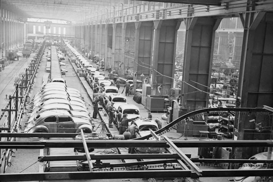  Workers on the production line at the Volkswagen factory at Wolfsburg in 1949