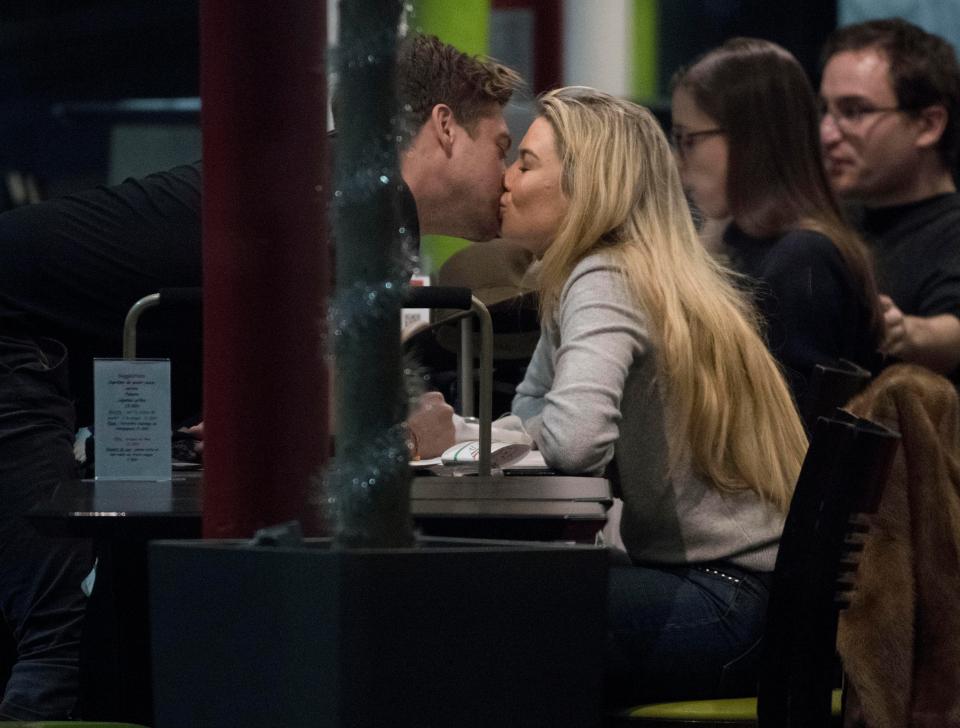  They were snapped kissing at the airport on their way home