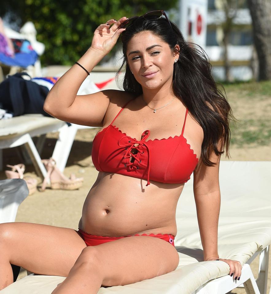  Casey wears a red bikini as she relaxes on holiday in Lanzarote