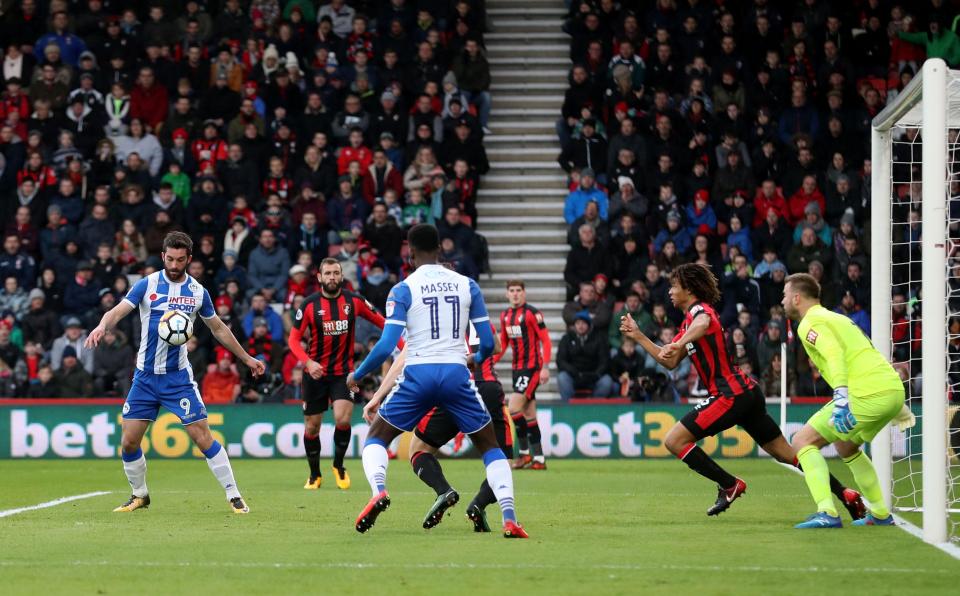  Wigan Athletic's Will Grigg controls the ball in the box before scoring after just four minutes play