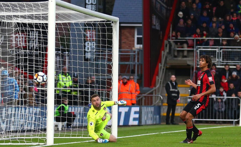  Artur Boruc was unable to stop Emerson Hyndman's own goal- which doubled Wigan's lead before the end of the first-half