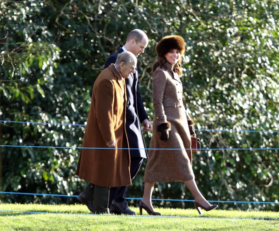  Kate, Phillip and William looked happy this morning as they strolled to the Sandringham service