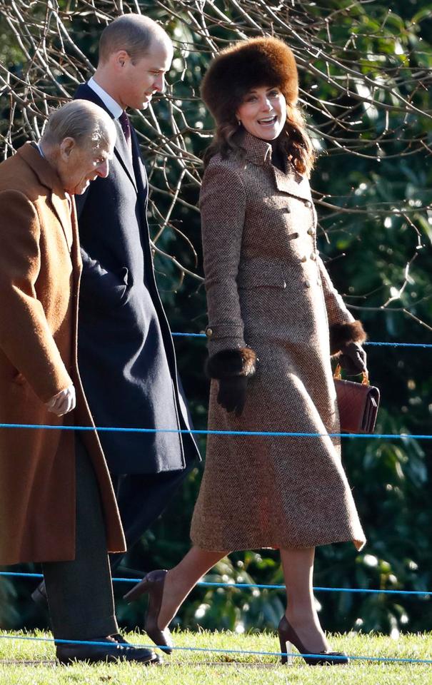  Prince Philip, Prince William and Kate Middleton walk back from the Epiphany service at St Mary Magdalene Church