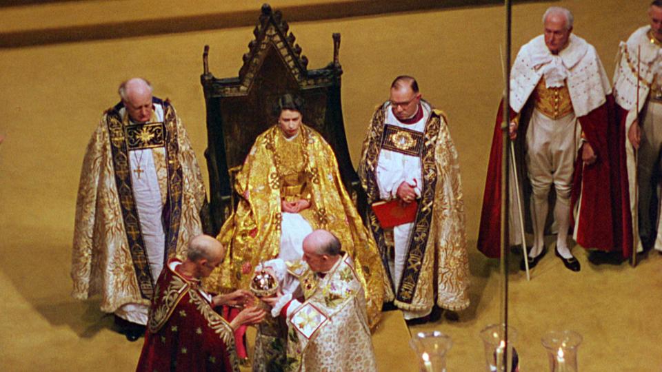  The Queen sits on the coronation chair in Westminster Abbey