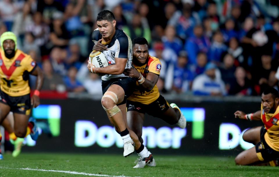  Kato Ottio, pictured making a tackle, was due to travel to the UK to play for Widnes