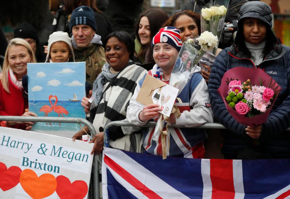  Royal fans turned up in force with posters and flowers