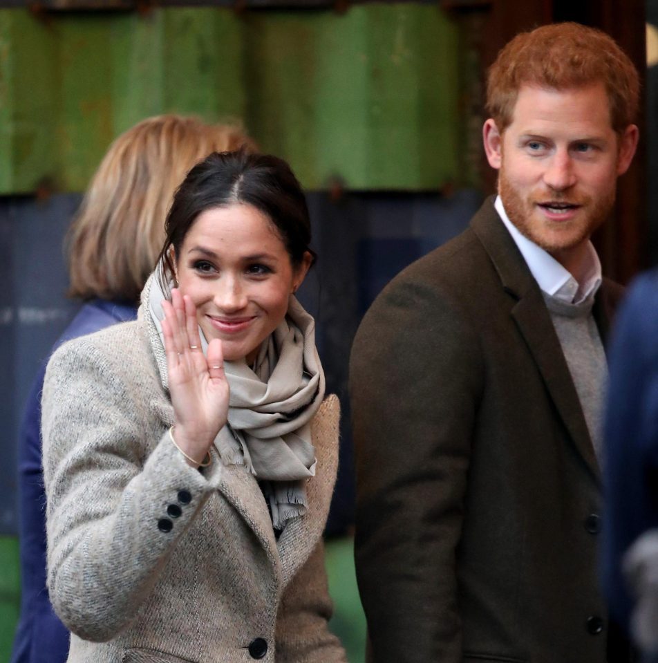  Meghan accessorised her outfit with several gold rings on her right hand