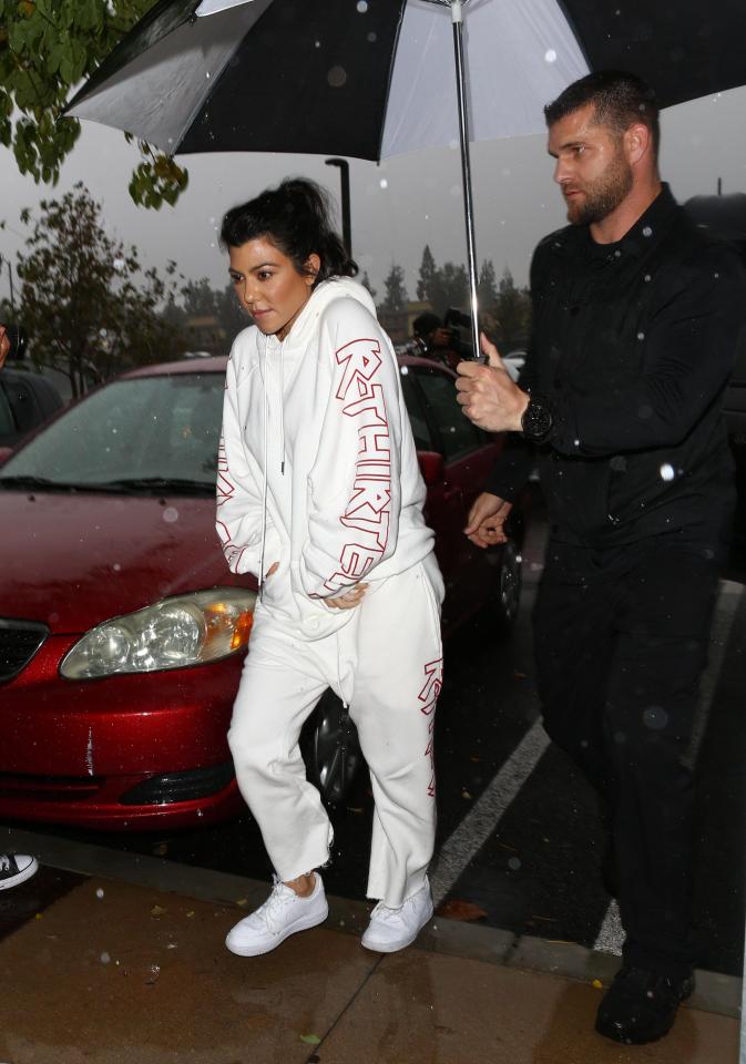 Kourtney Kardashian kept her look casual in an $835 matching hoodie and jogging bottoms