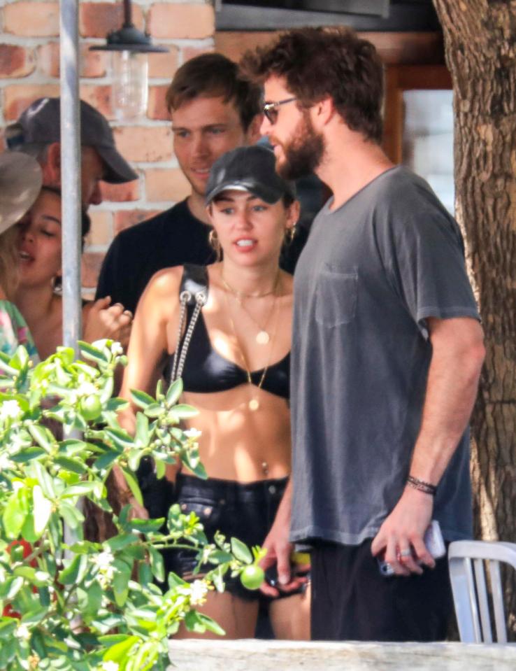  Liam Hemsworth and Miley Cyrus were both spotted wearing rings on their wedding fingers