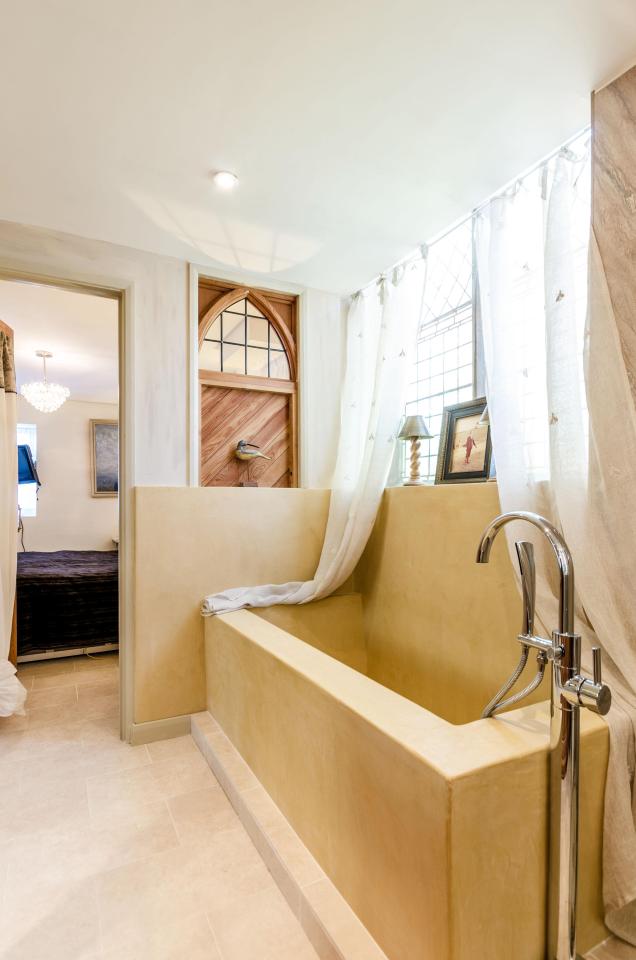  The bath, made from Moroccan plaster, ensures water stays hot for six hours