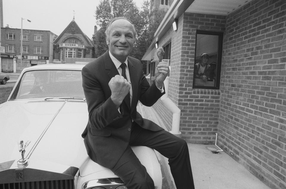  Boxing legend Henry Cooper with his Rolls-Royce