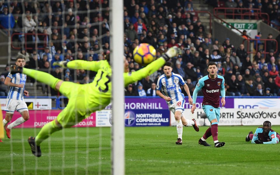  Joe Lolley curled in a beauty to draw Huddersfield level