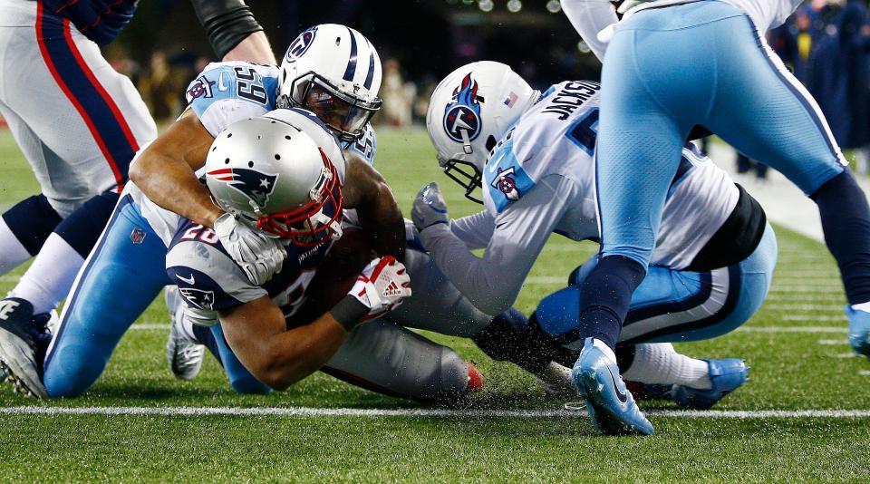  James White battles his way into the end zone for the second time