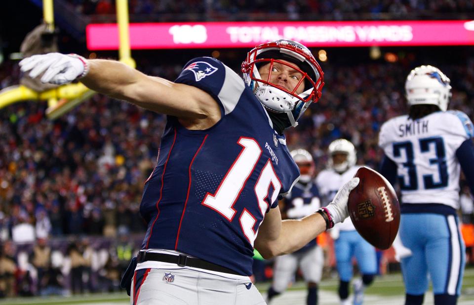  Chris Hogan throws the ball into the stands after scoring in the first half