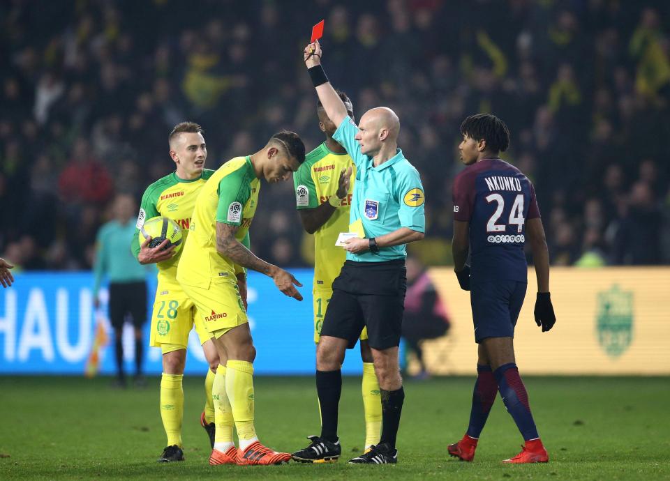  French referee Tony Chapron has been indefinitely banned after kicking a player and sending him off